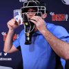 Umpire Wearing Throat Guard