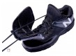 MUL460T3 New Balance V3 Black & White Low-Cut Umpire Plate Shoes Outside Back Angled View with Plate Up