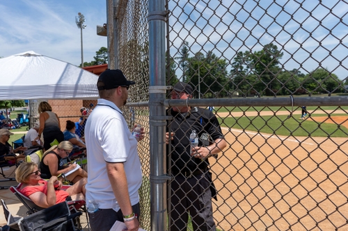 Umpire Being Mentored by Brandon