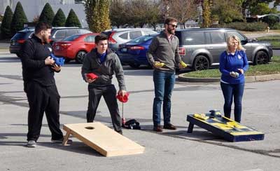 Staff Plays Cornhole