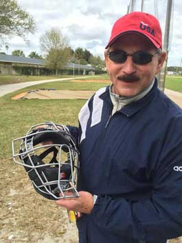 Jim Evans holds Force3 Umpire Mask