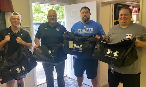 Ump Attire Staff Deliver Donations to Kyle Maggard