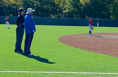 Instructor Watches Umpire Clinic