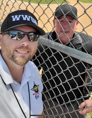 Brandon Lawson with Student in Umpire Uniform