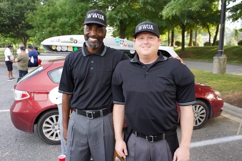 2 WWUA Students Pose in Umpire Uniforms